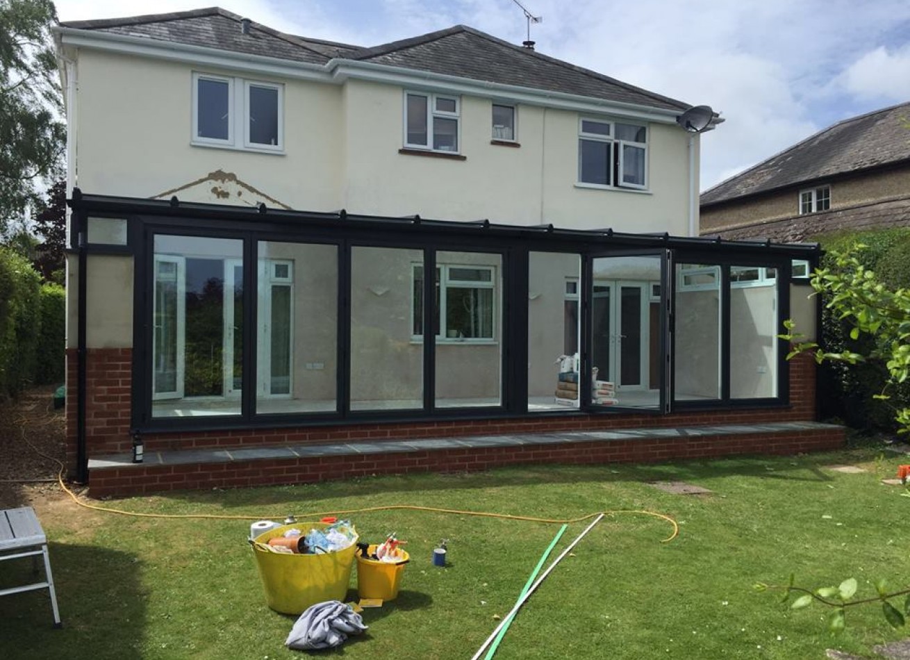Lean to conservatory with bifold doors